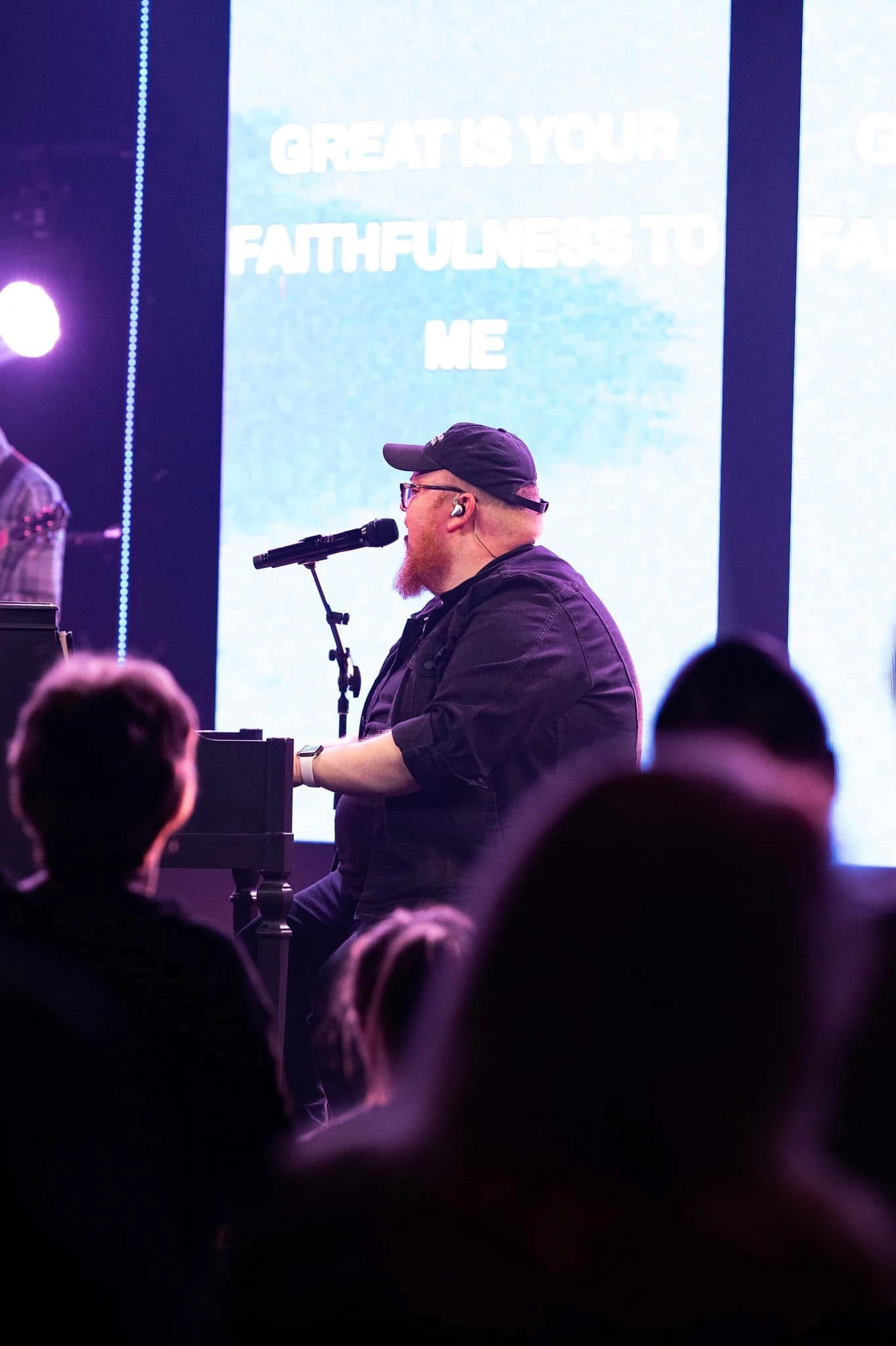David leading worship at the keyboard
